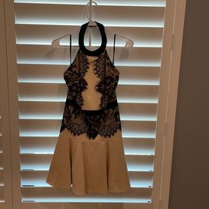 Flirty beige and lace Bebe dress